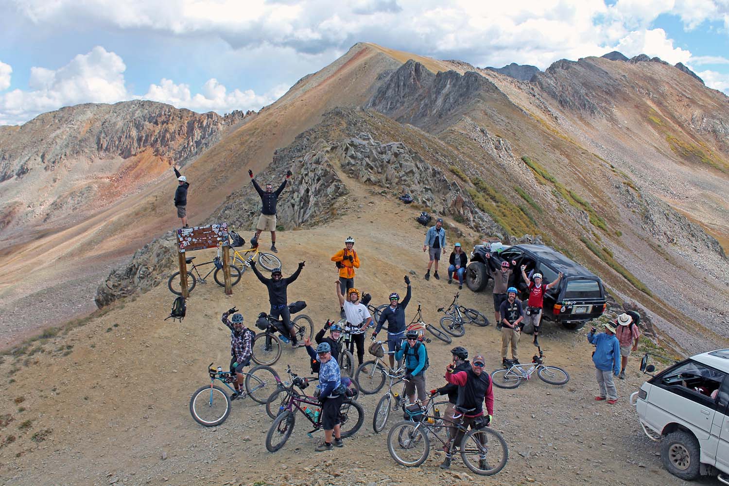 Pearl Pass Tour riders on the summit of Pearl pass on the way to Aspen from Crested Butte.  Photo by Rob Korotky
